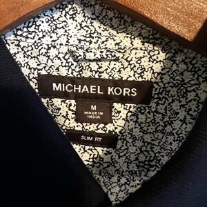 Michael Kors Men’s white/navy blue shorts sleeveless shirt.